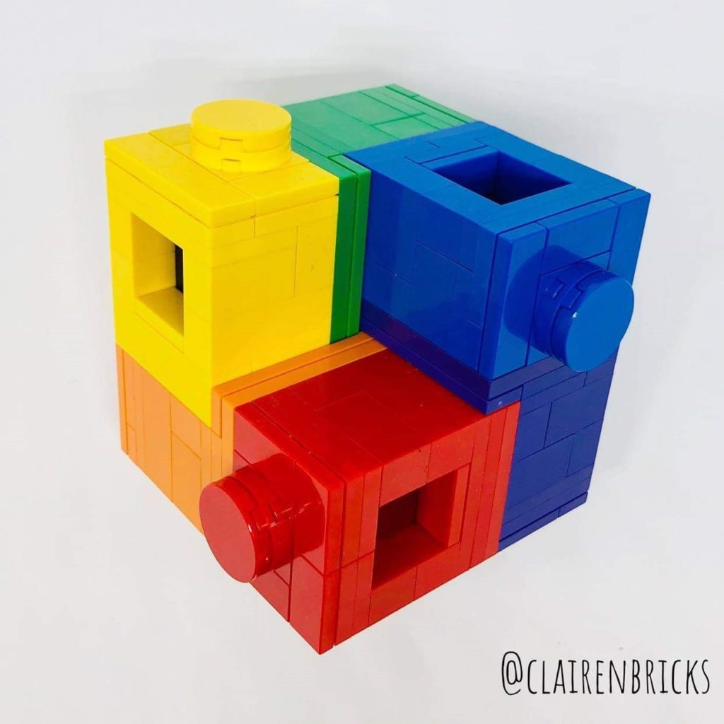 LEGO build of a 5 brick-built washing machine bricks in rainbow colours.